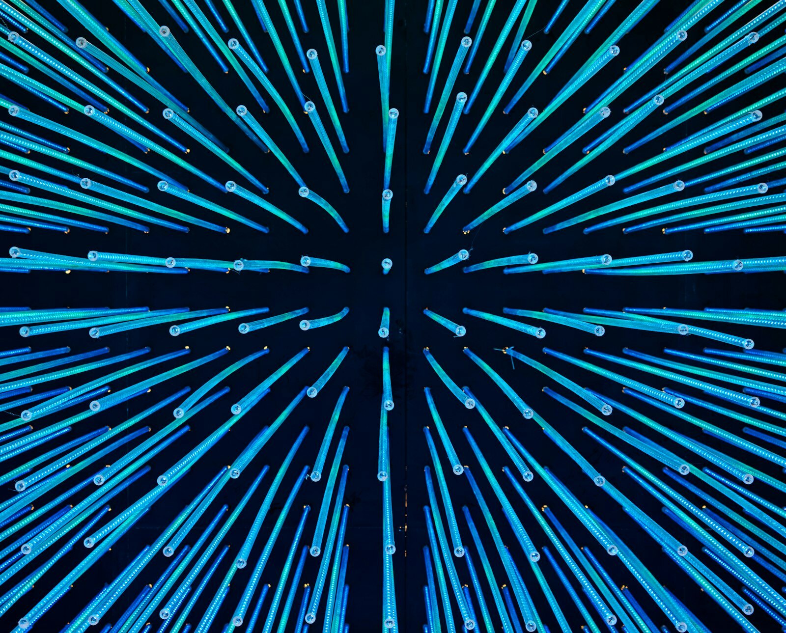 Abstract blue lines radiating from a central point